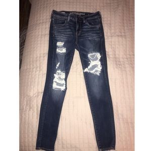 Dark wash distressed jeggings